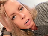 Blonde teen in solo action with her pussy