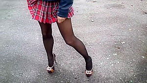 Nylon tights, high heel and school skirt