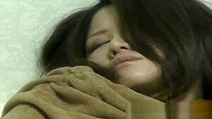 Asian babe rubs herself