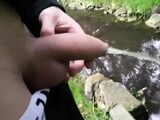 Pissing Outdoors with a Big Cock Twink